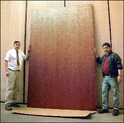 Two men with big door